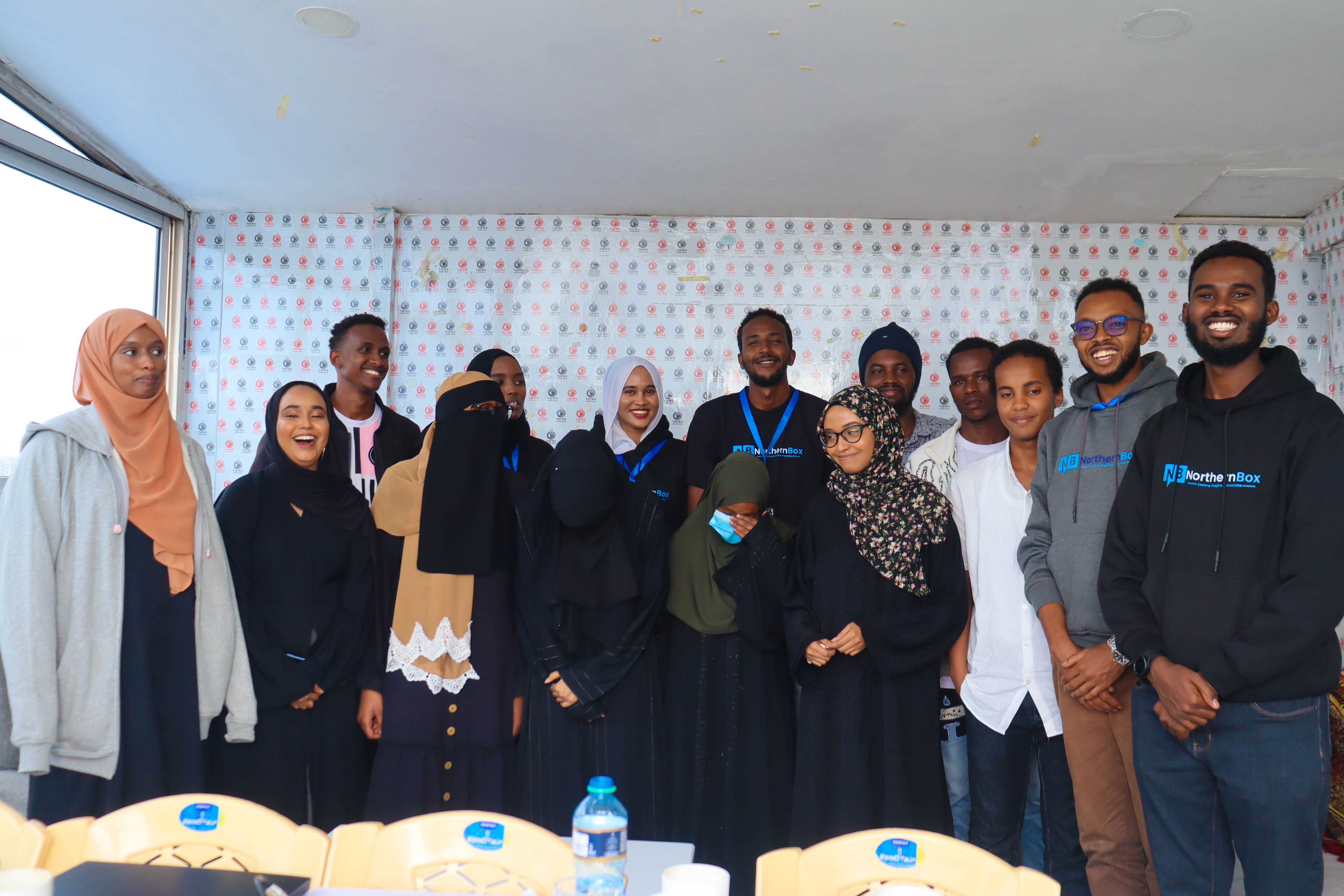 Northern Kenya landscape with youth learning technology